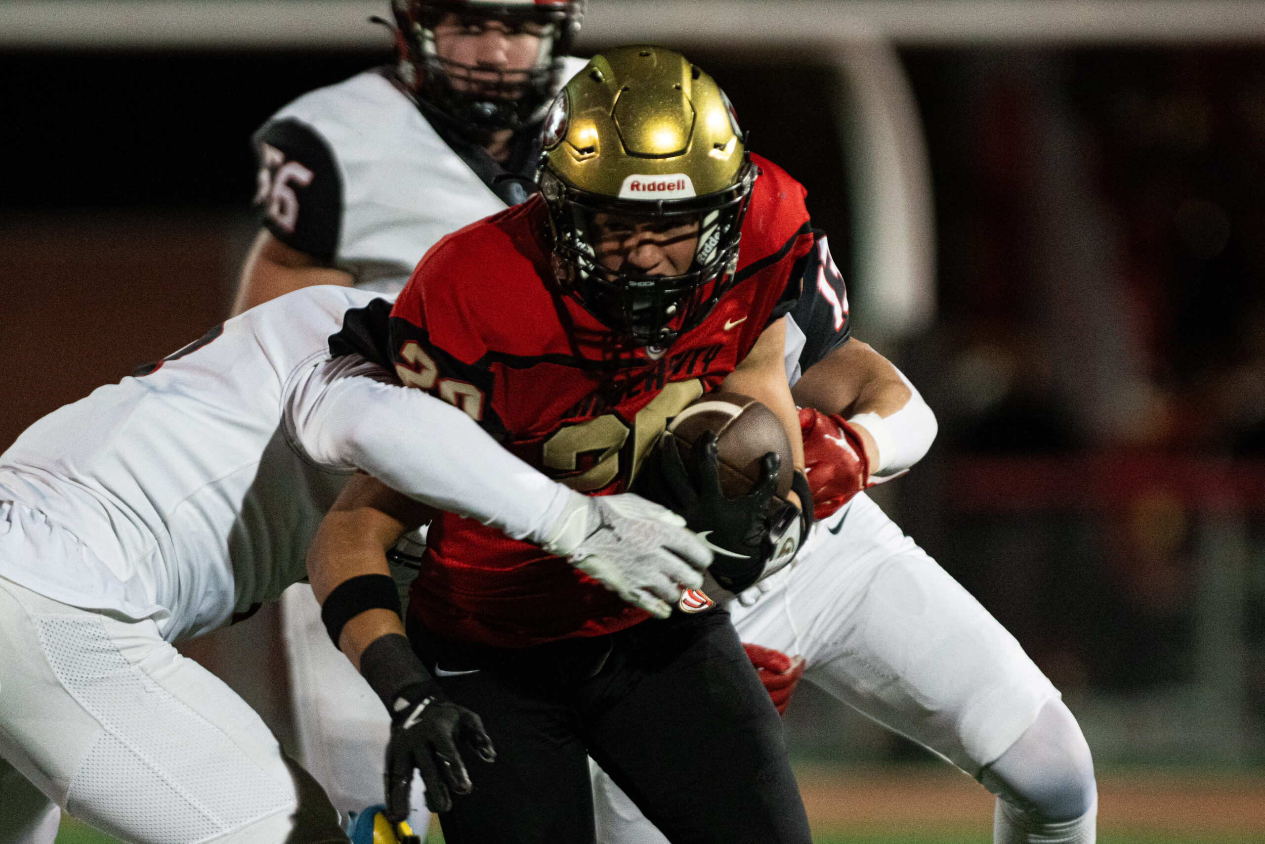 Oak Hill uses strong second half to race past University 34-28